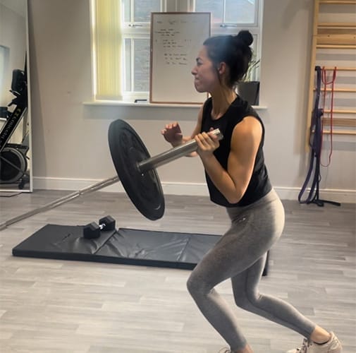 Home 2 woman lifting weights at The Studio Salcombe